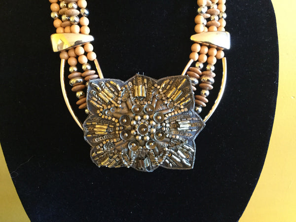 Corn Husk Medallion Necklace.